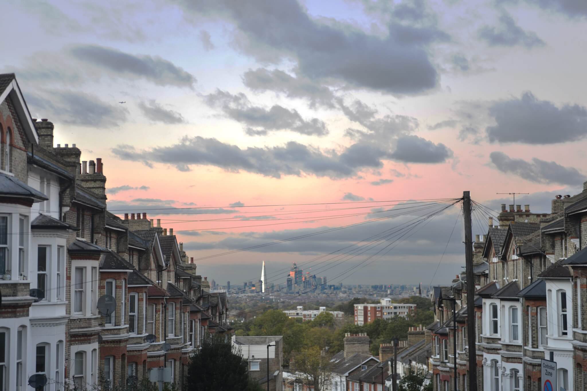 Suburban street in Crystal palace south london WITH THE SHARD AND THE CITY OF LONDON ON THE HORIZON